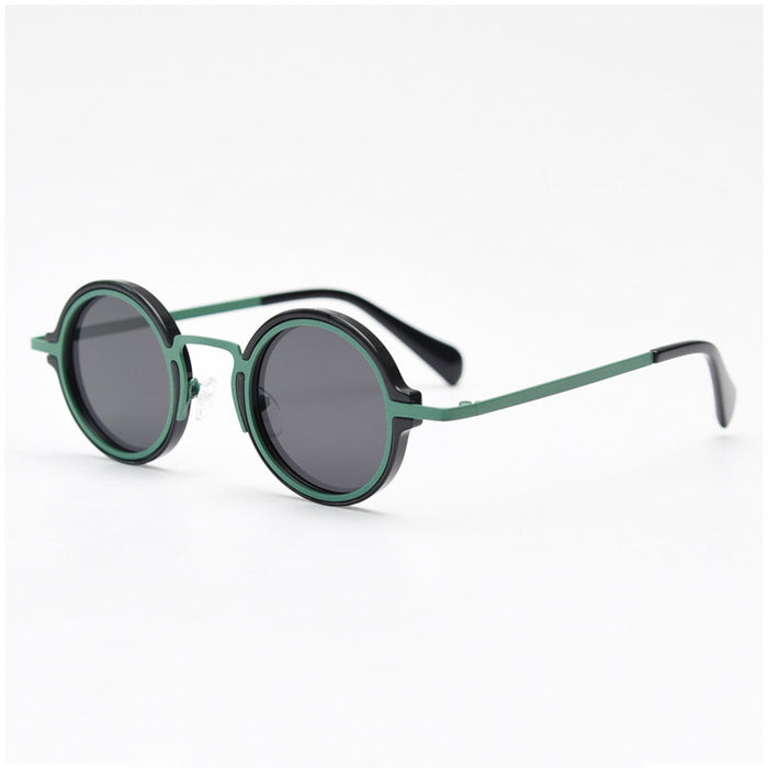Side view of two-tone dark green and black round-frame sunglasses, featuring thin metal temples.