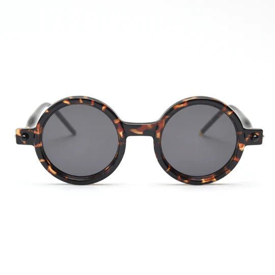 Front view of tortoiseshell round-frame sunglasses with dark gray lenses.