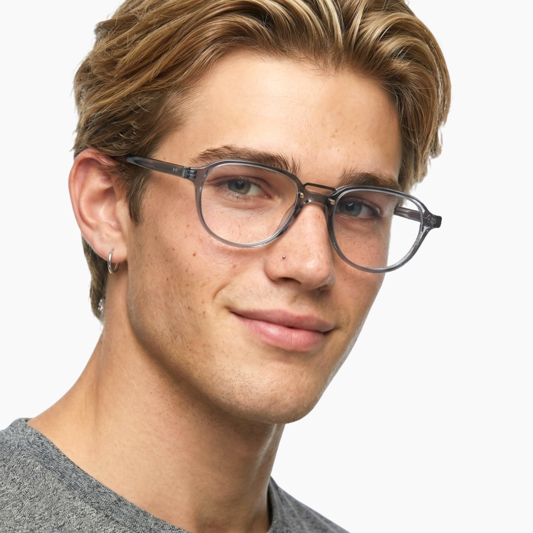Three-quarter view of male wearing vintage grey aviator eyeglasses, natural expression, AA0062306