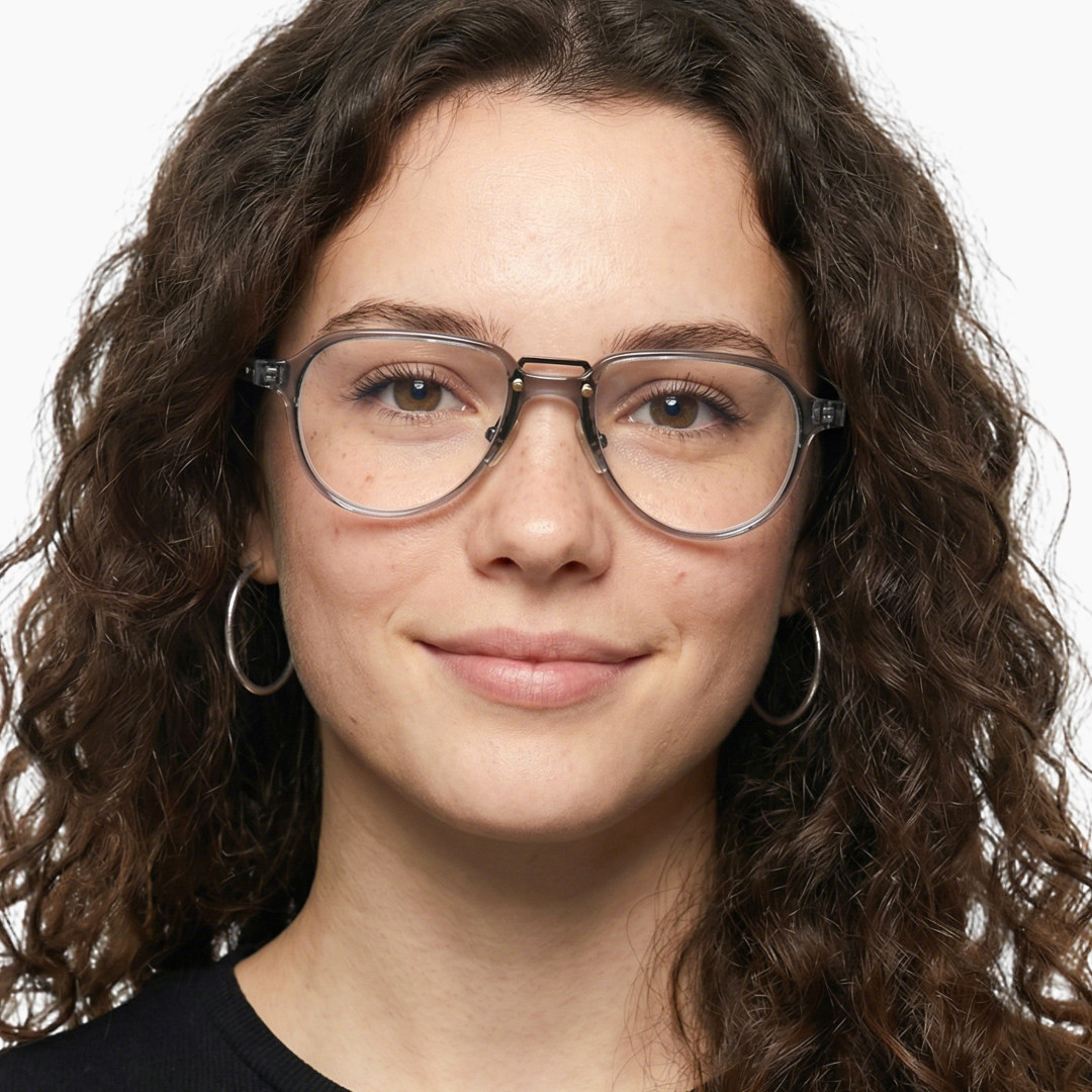 Front view of female wearing vintage grey aviator eyeglasses, neutral expression, AA0062306
