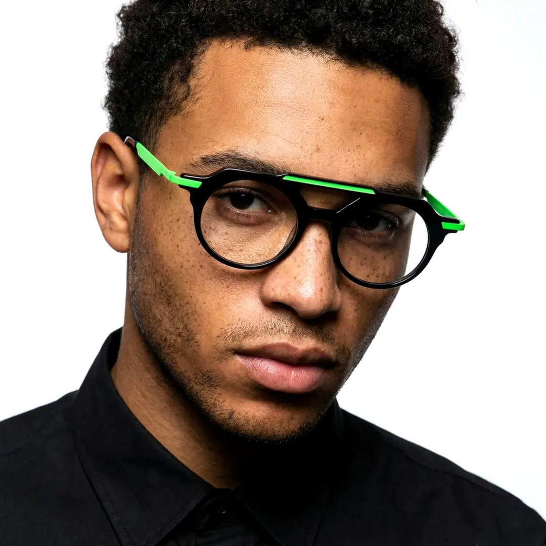 Three-quarter view of male wearing vintage black aviator eyeglasses, neutral expression, AA0082302