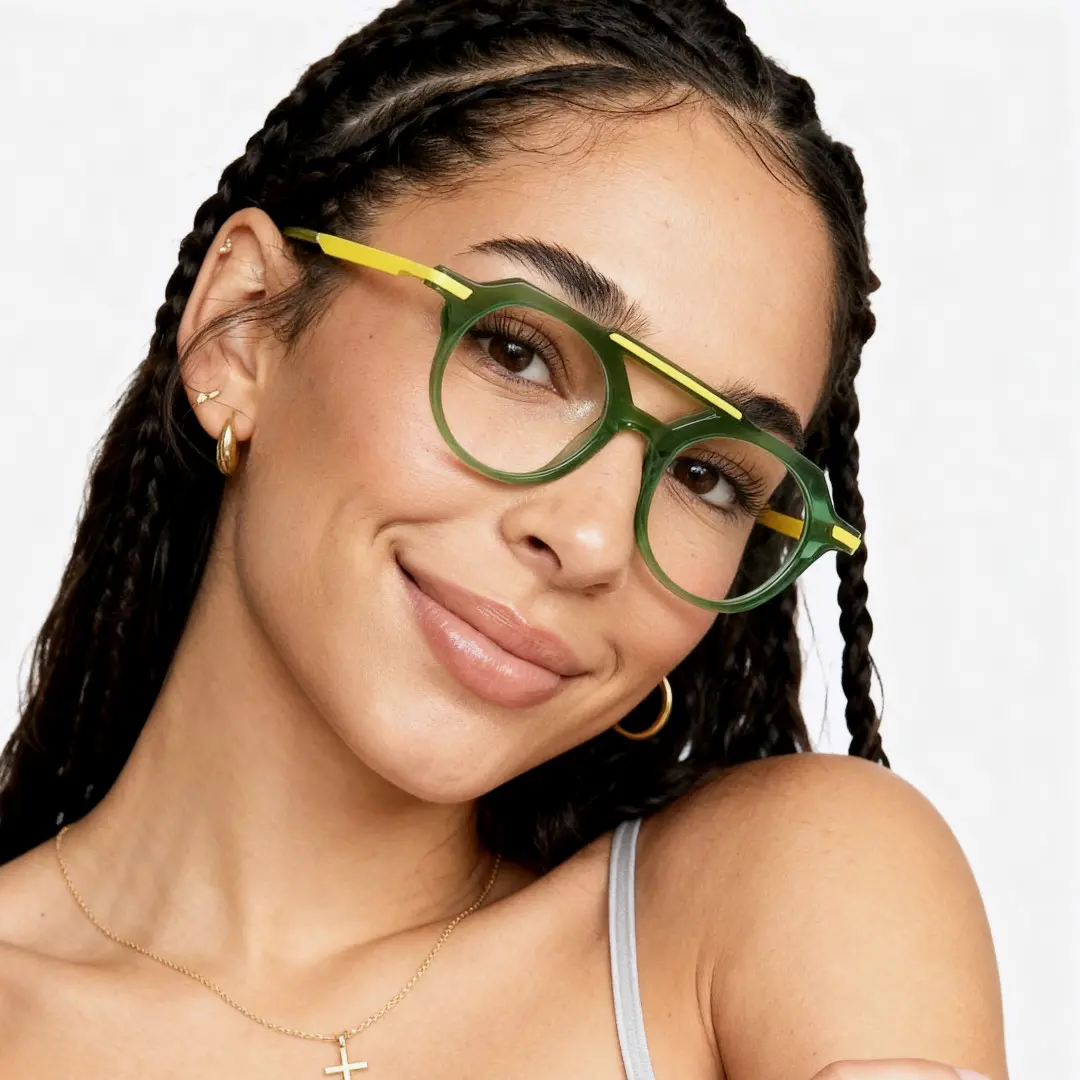 Looking straight ahead view of male wearing green aviator eyeglasses, smiling, AA0082302