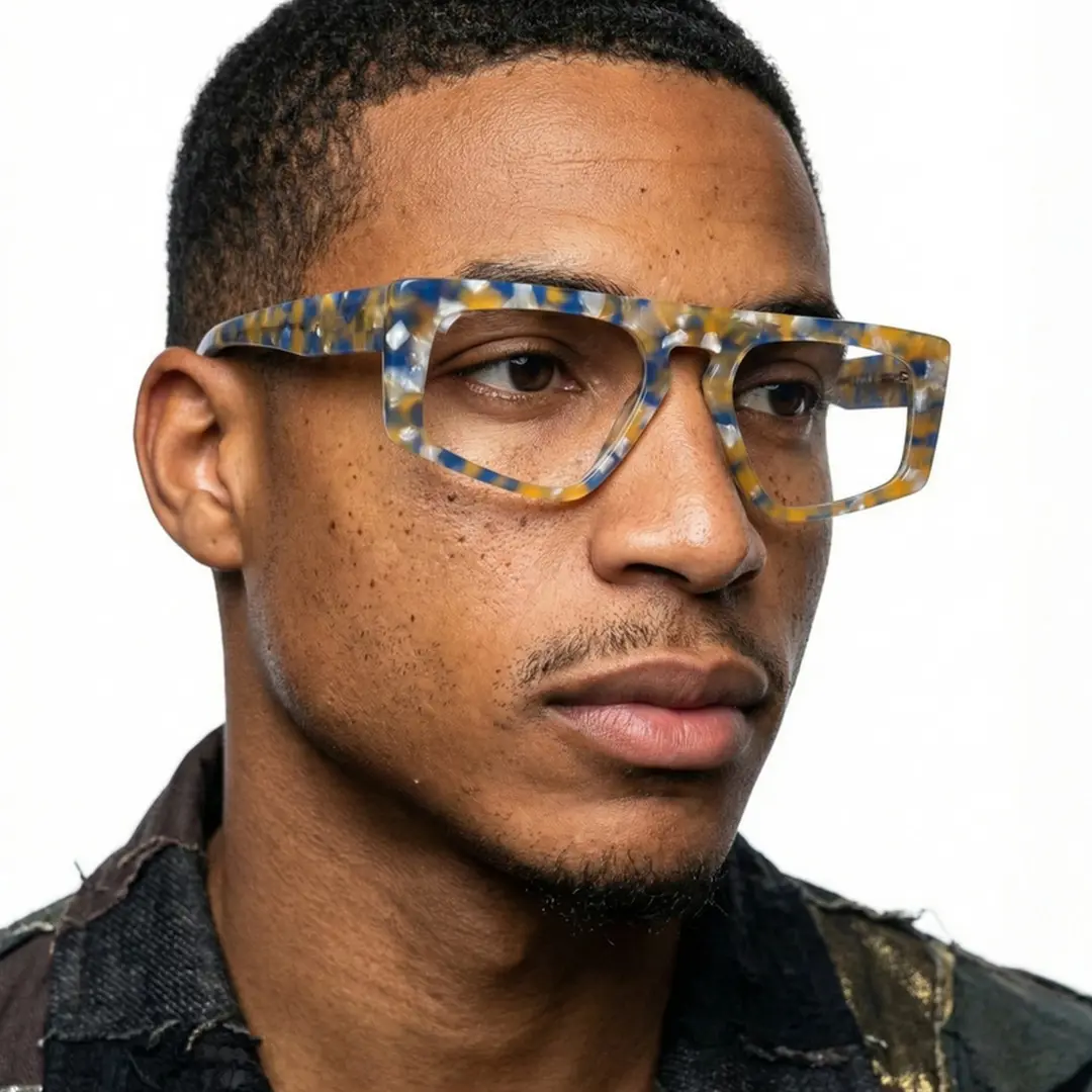 Looking away view of male wearing yellow tortoise aviator eyeglasses, neutral expression, AA0122403