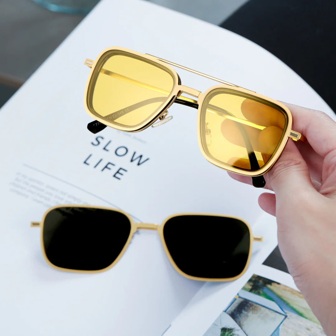 Scene close up view of Zarek fashion aviator metal magnetic clip-on eyeglasses set with interchangeable toppers AM0192409 in gold