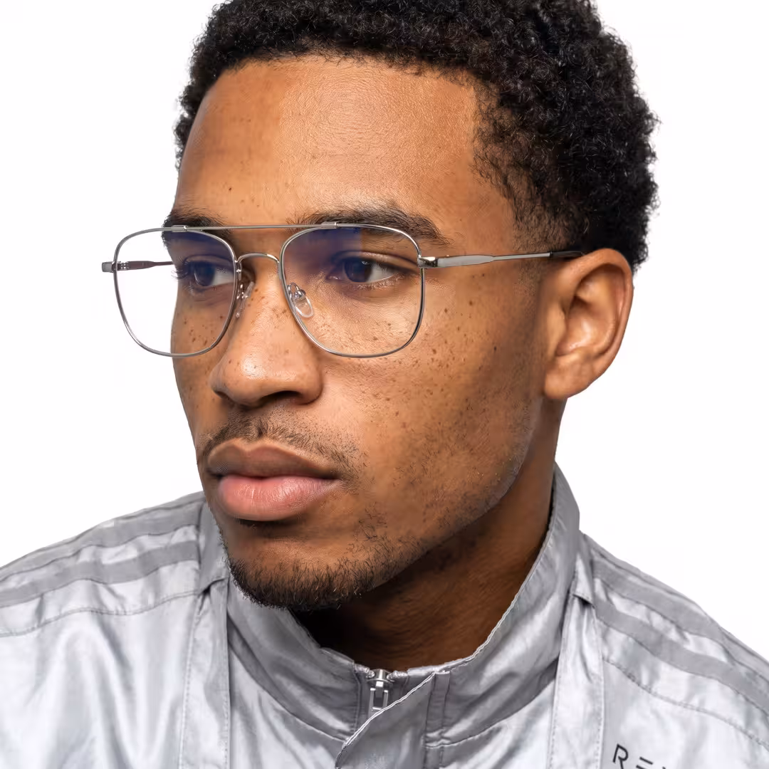 Male wearing sliver aviator metal eyeglasses, neutral expression. SPU: AM0202605