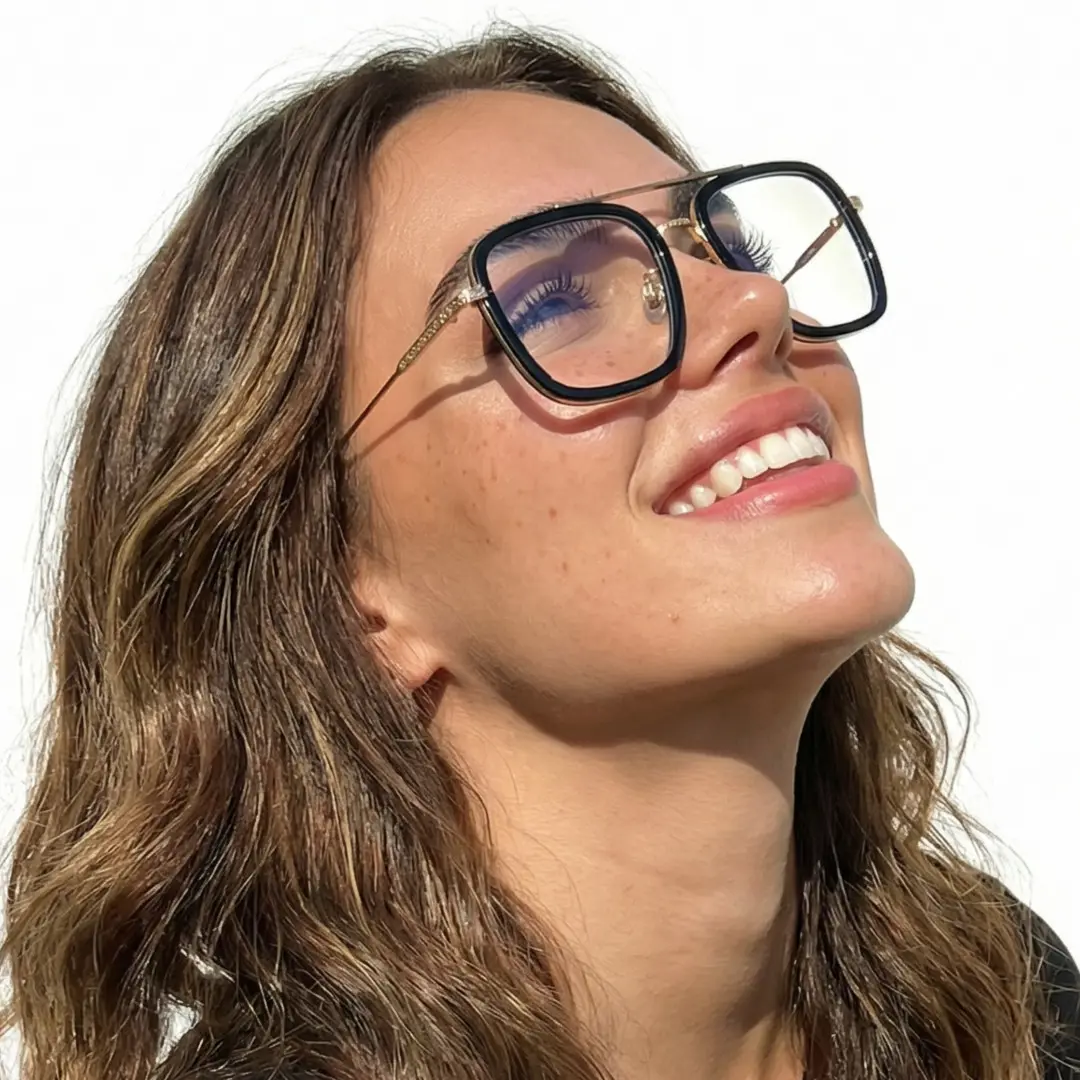 Looking away view of female wearing black gold aviator eyeglasses, big smile, AM0222409