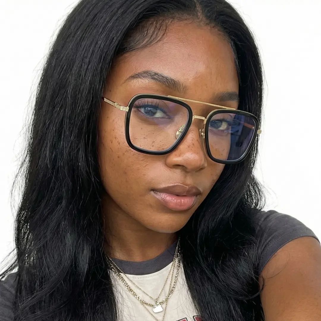 Front view of female wearing black gold aviator eyeglasses, taking a selfie, neutral expression, AM0222409