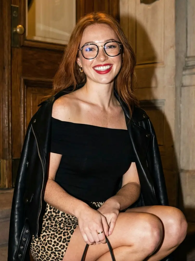 Female model wearing fashion gold aviator metal eyeglasses in a warm indoor setting. SPU: AM0242410