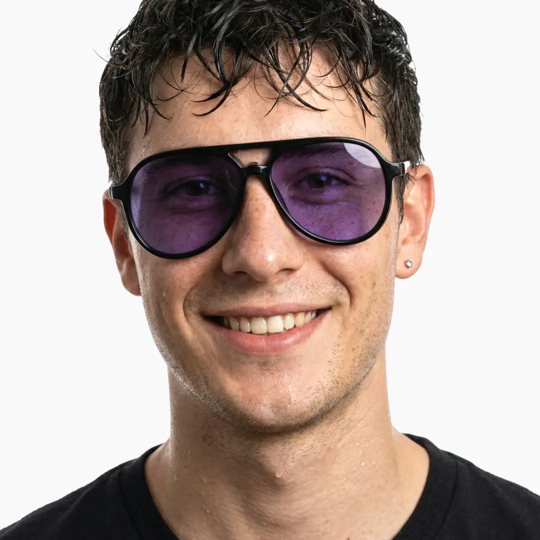 Front view of male wearing black aviator magnetic clip-on eyeglasses set with interchangeable clip-on lenses, natural smile, AR0122601