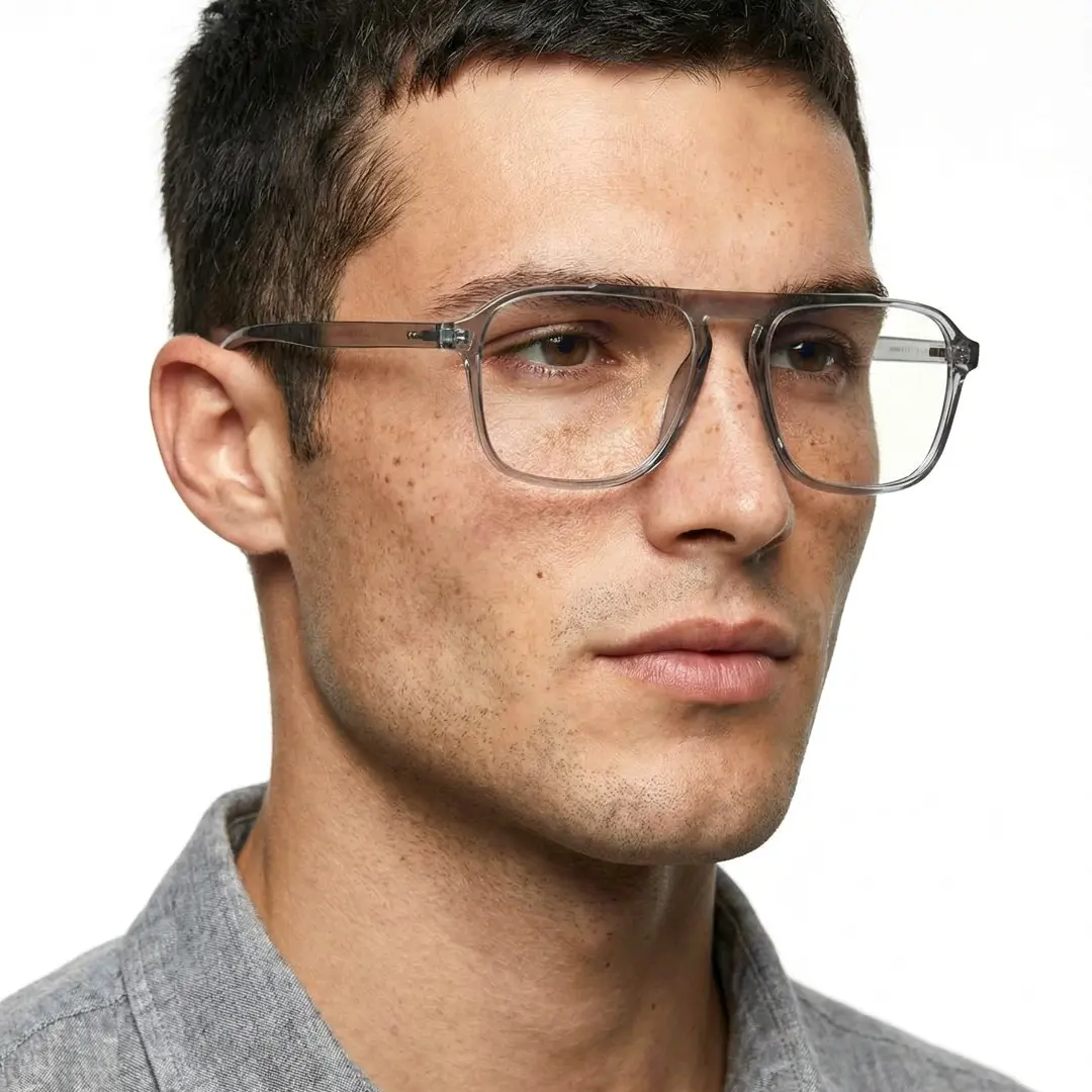Three-quarter view of male wearing grey aviator eyeglasses, calm expression, AR0142410