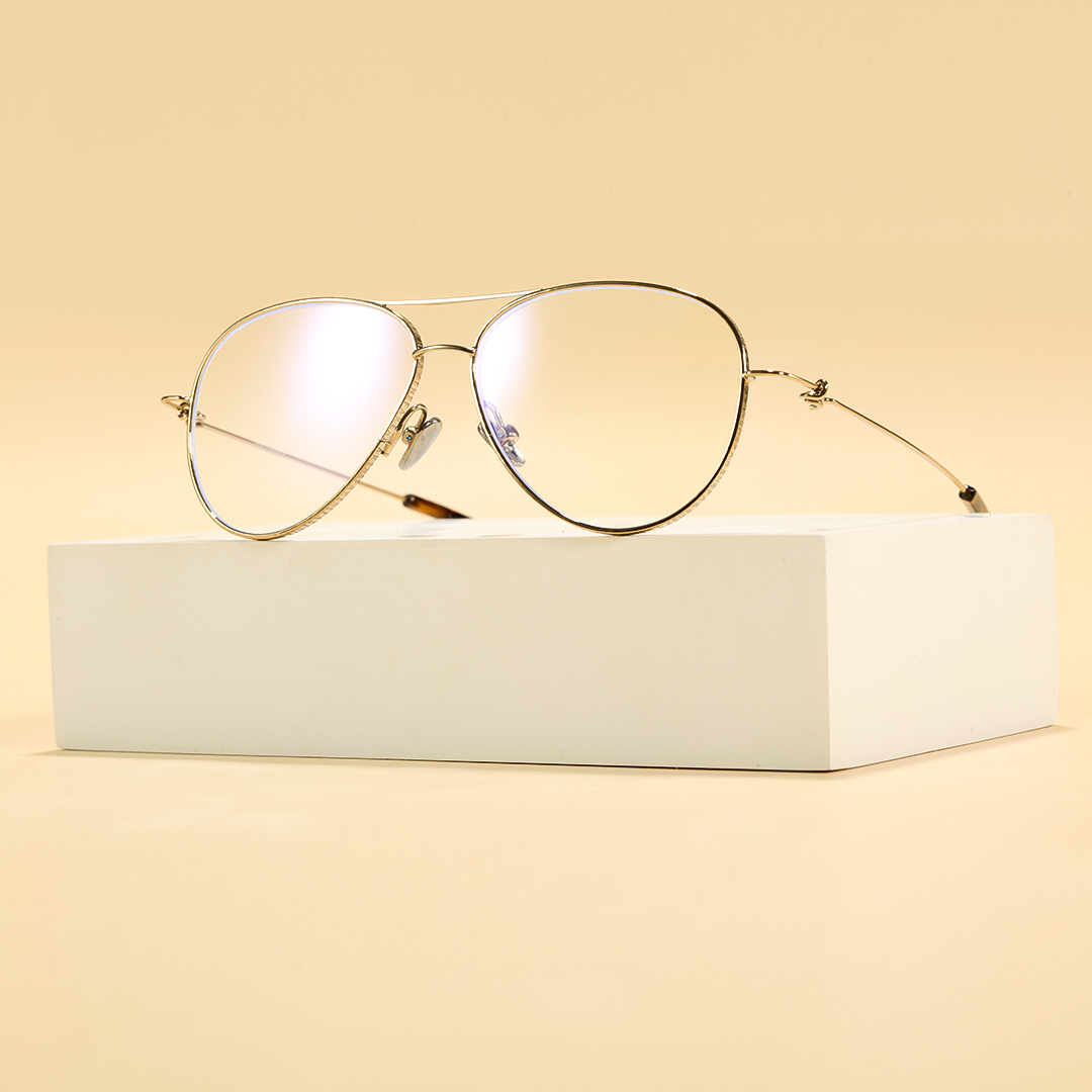 Scene view of Calder aviator titanium eyeglasses AT0262601 in gold
