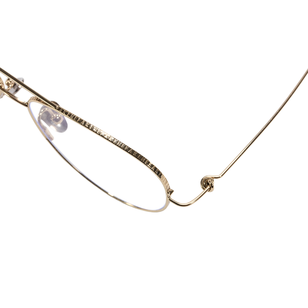 End piece detail of Calder vintage aviator titanium eyeglasses in gold. SPU: AT0262601