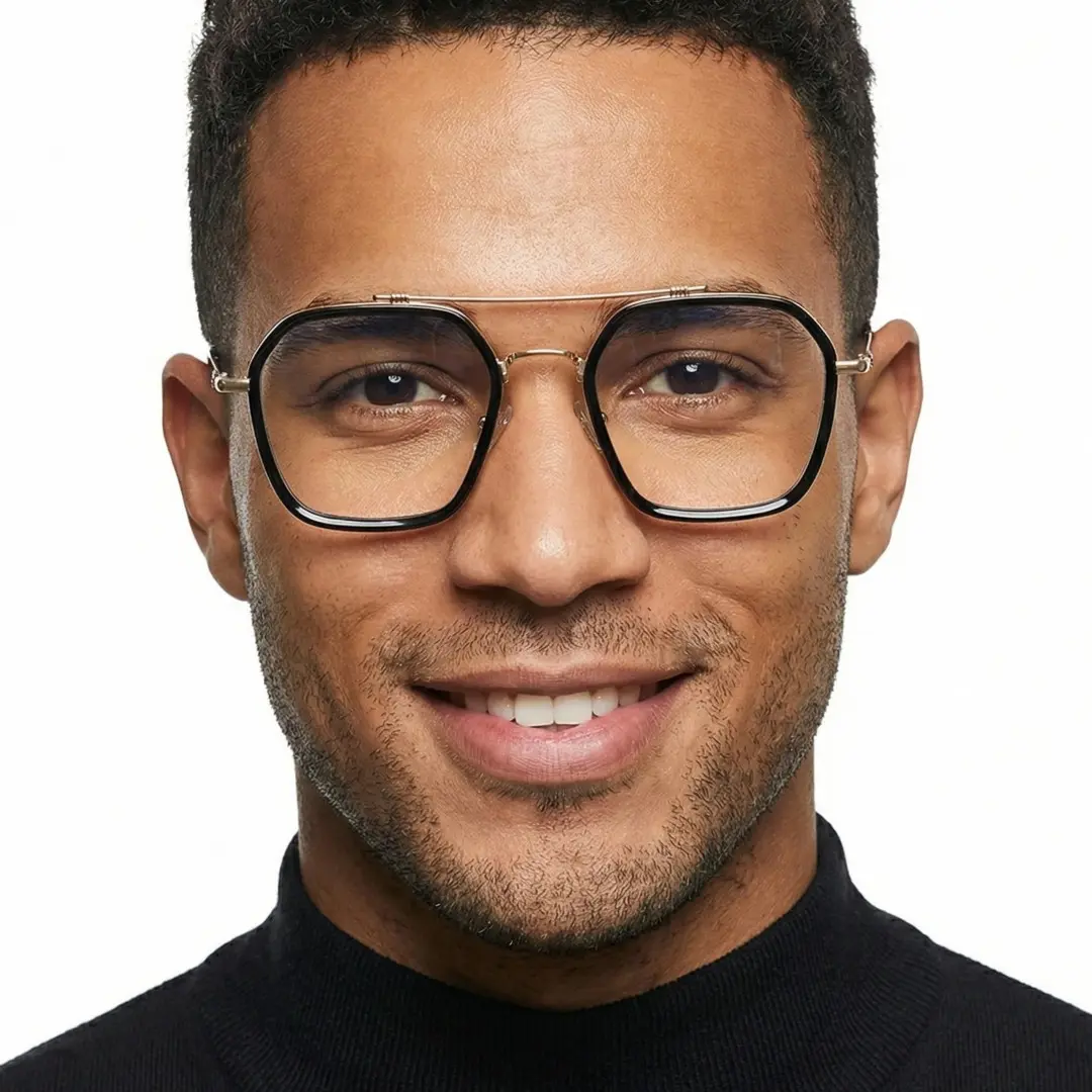 Front view of male wearing black aviator eyeglasses, natural smile, AX0122507