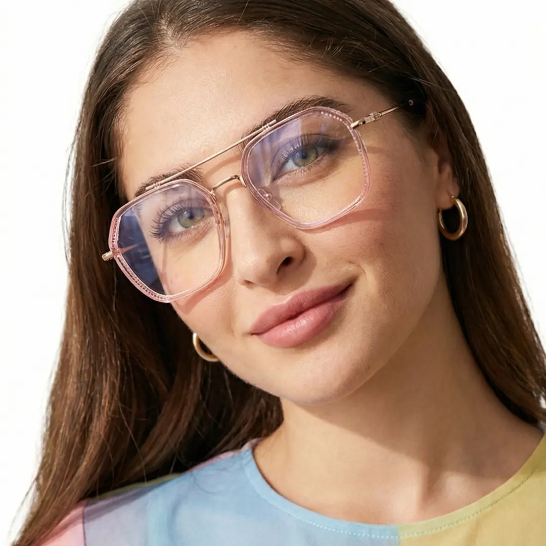 Three-quarter view of female wearing pink aviator eyeglasses, tilting head, soft smile, AX0132507