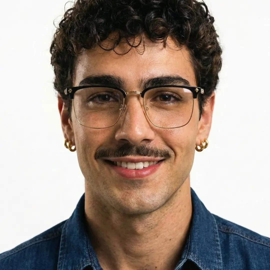 Front view of male wearing gold browline eyeglasses, friendly smile, BM0102501