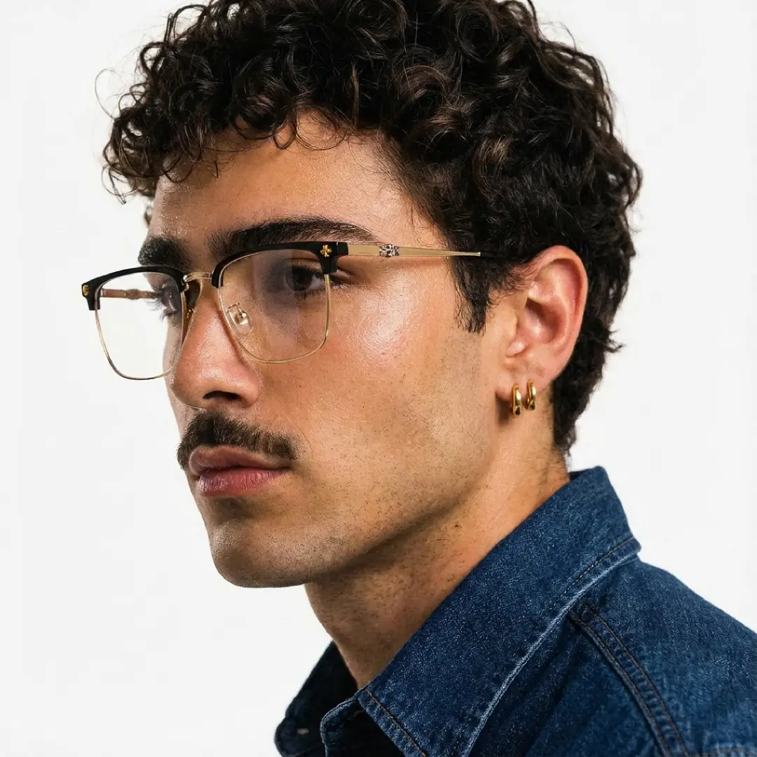 Looking away view of male wearing gold browline eyeglasses, neutral expression, BM0102501