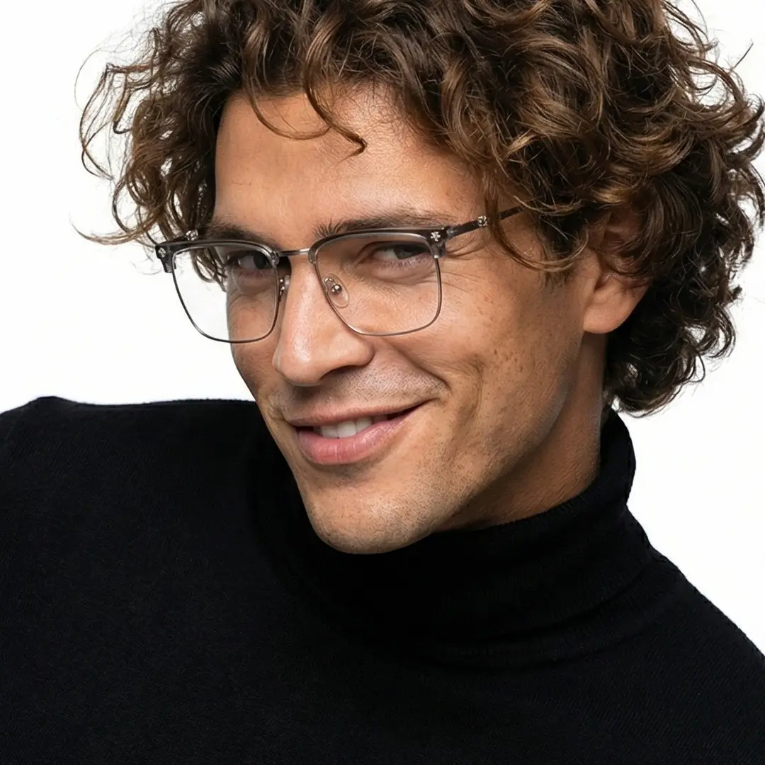 Looking straight ahead view of male wearing grey browline eyeglasses, soft smile, BM0102501