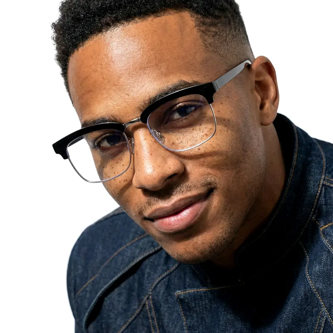 Front view of male wearing black browline eyeglasses, friendly smile, BR0102310