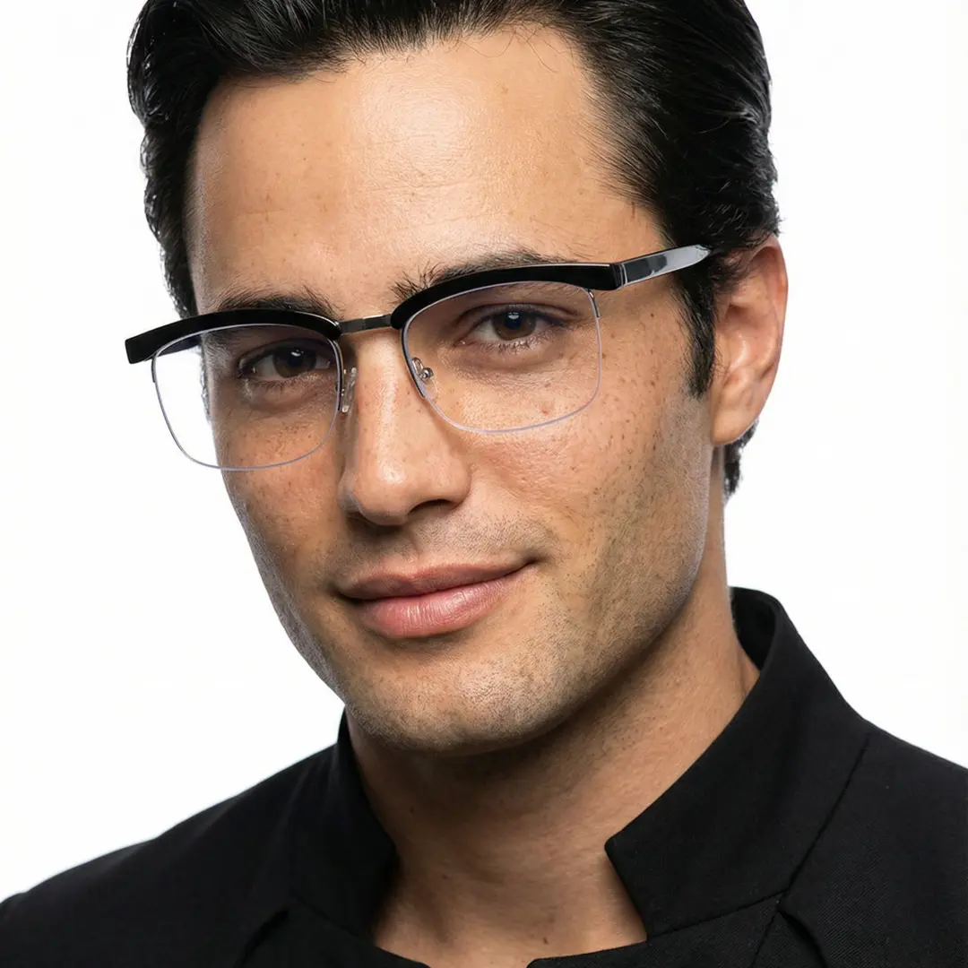 Front view of male wearing black browline eyeglasses, hand near face, smiling, BR0102310