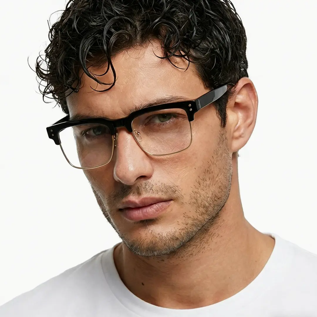 Front view of male wearing black gold browline eyeglasses, calm expression, BR0572505