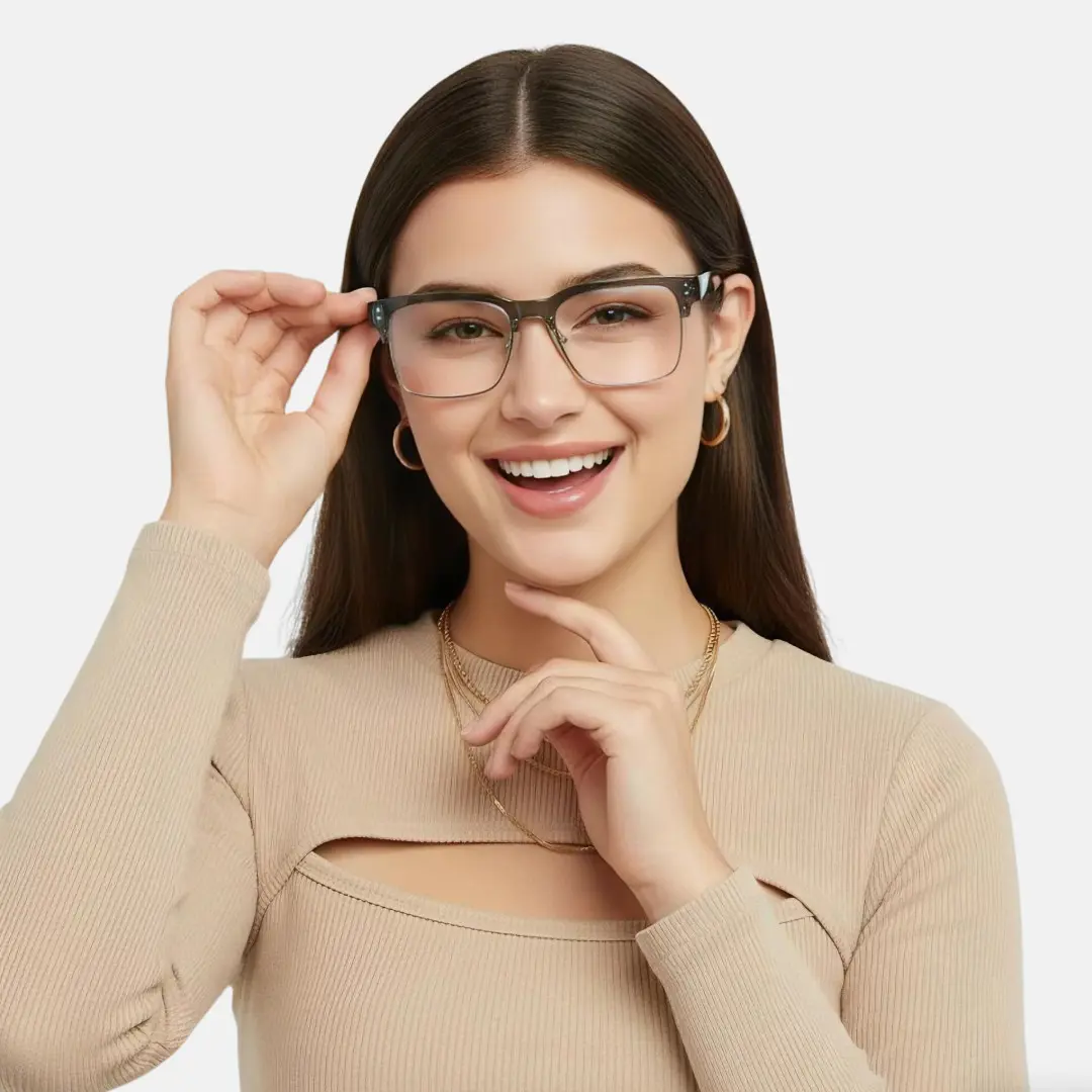 Front view of female wearing grey browline eyeglasses, touching frame, smiling, BR0572505