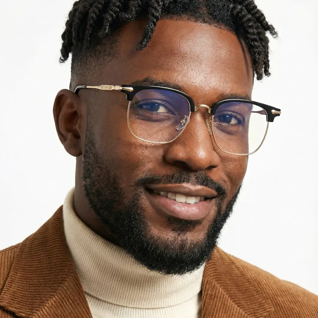 Face close up of male wearing black browline eyeglasses, friendly smile, BX0392509