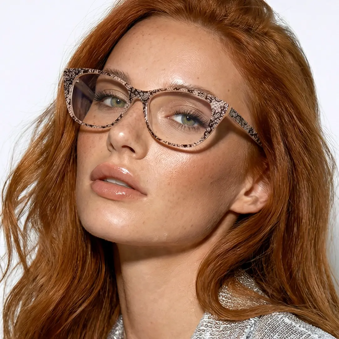 Tilted head view of female wearing brown cat eye eyeglasses, neutral expression, CA0012208