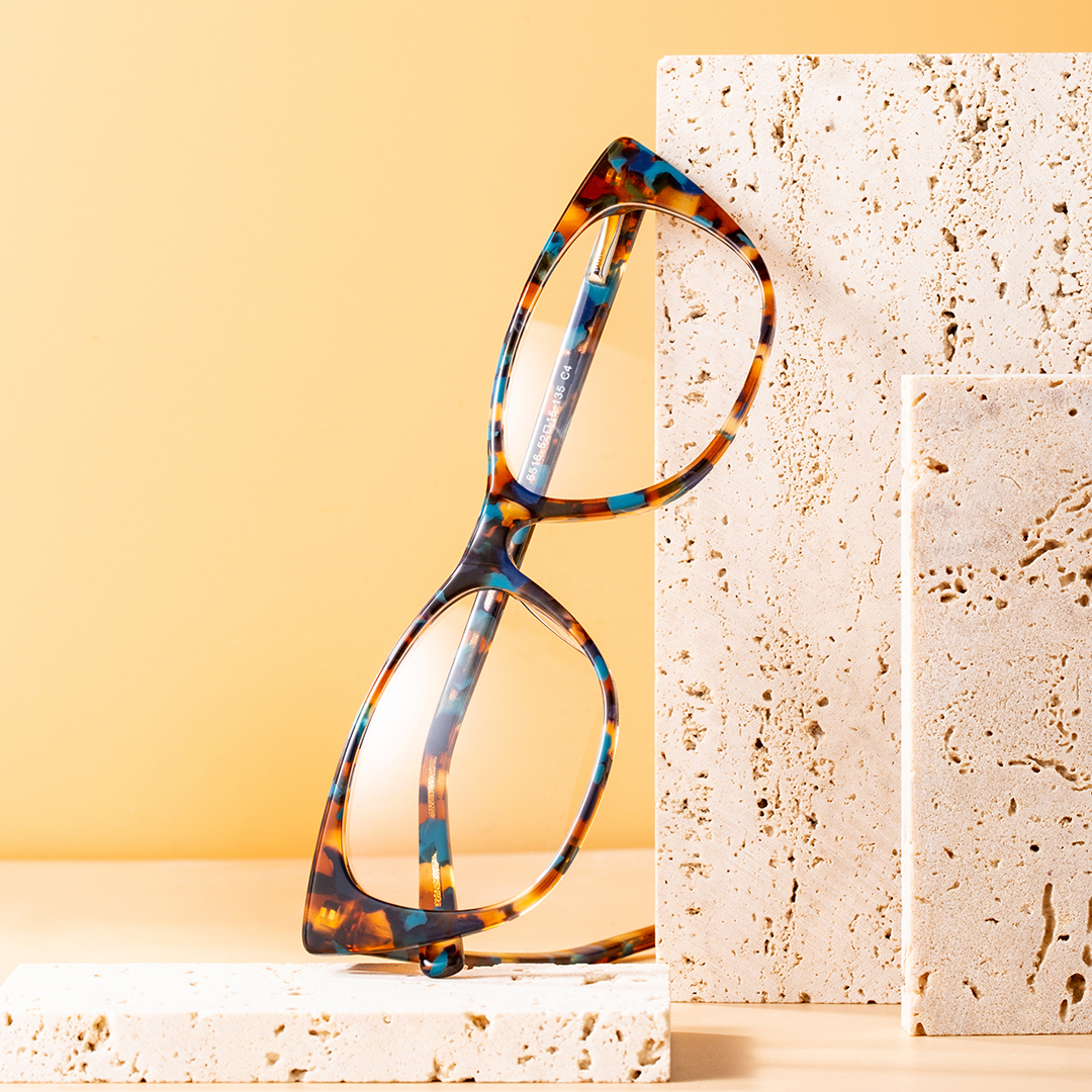 Scene close-up view of Poppy cat eye acetate eyeglasses CA0012208 in brown tortoise