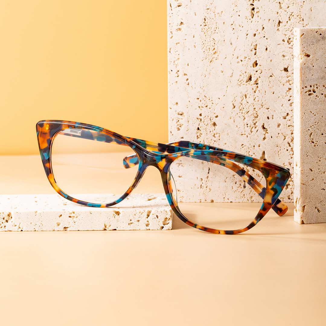 Scene view of Poppy cat eye acetate eyeglasses CA0012208 in brown tortoise