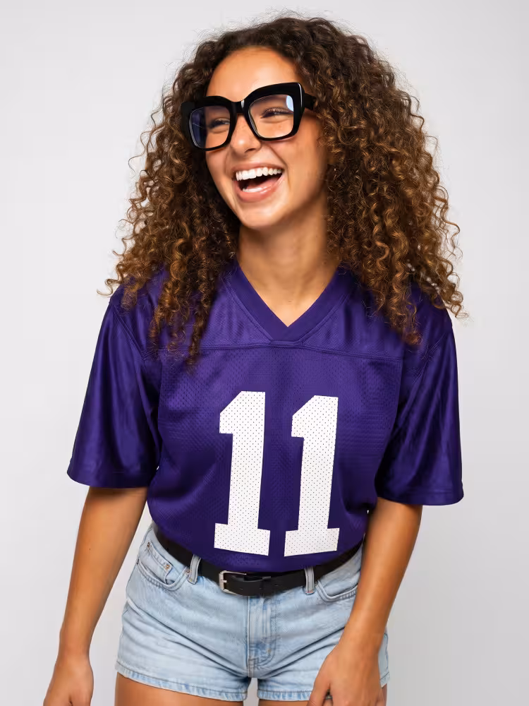 Female model wearing colorful black square acetate eyeglasses in a studio setting. SPU: CA0032503
