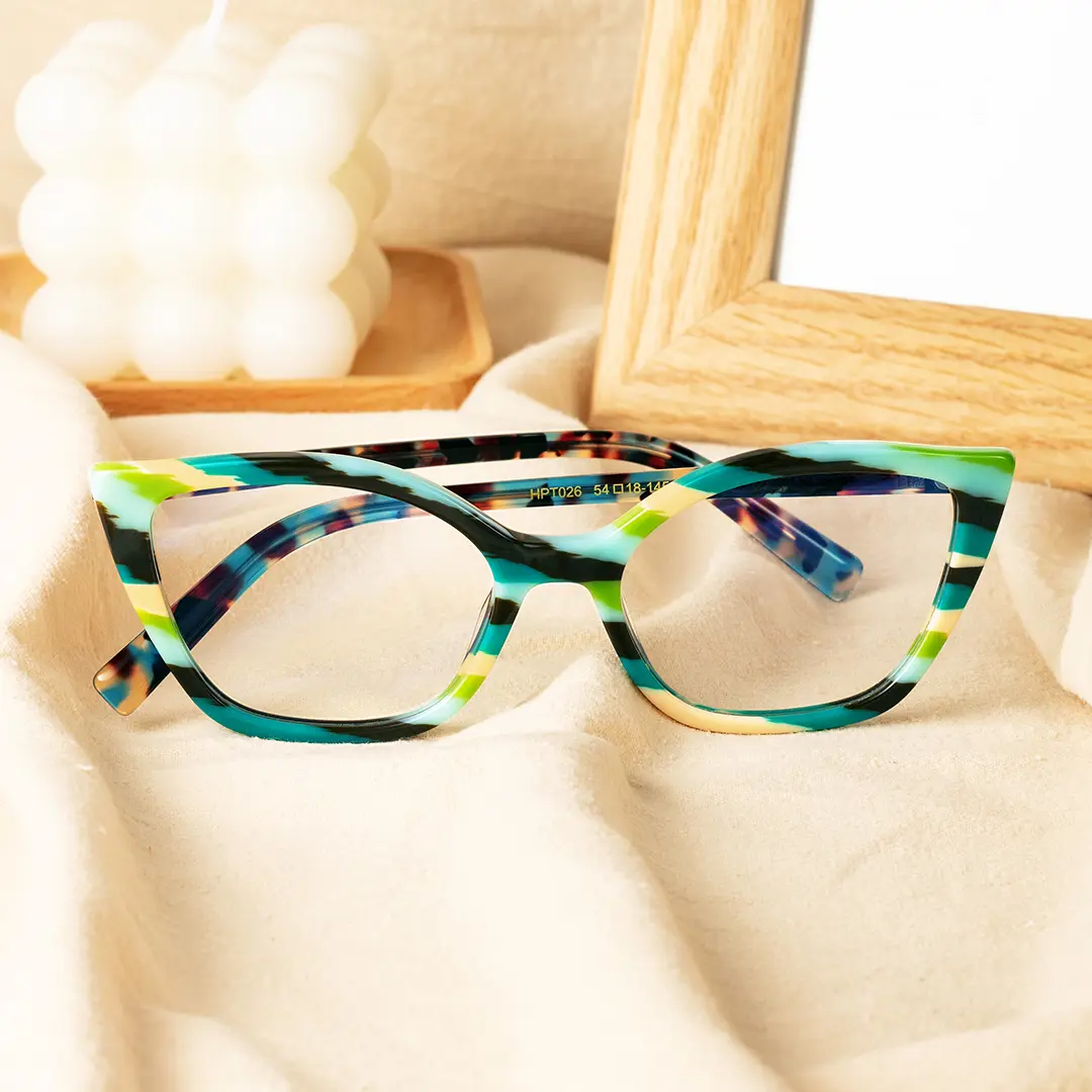 Scene close up view of ben cat eye acetate eyeglasses CA0102306 in green