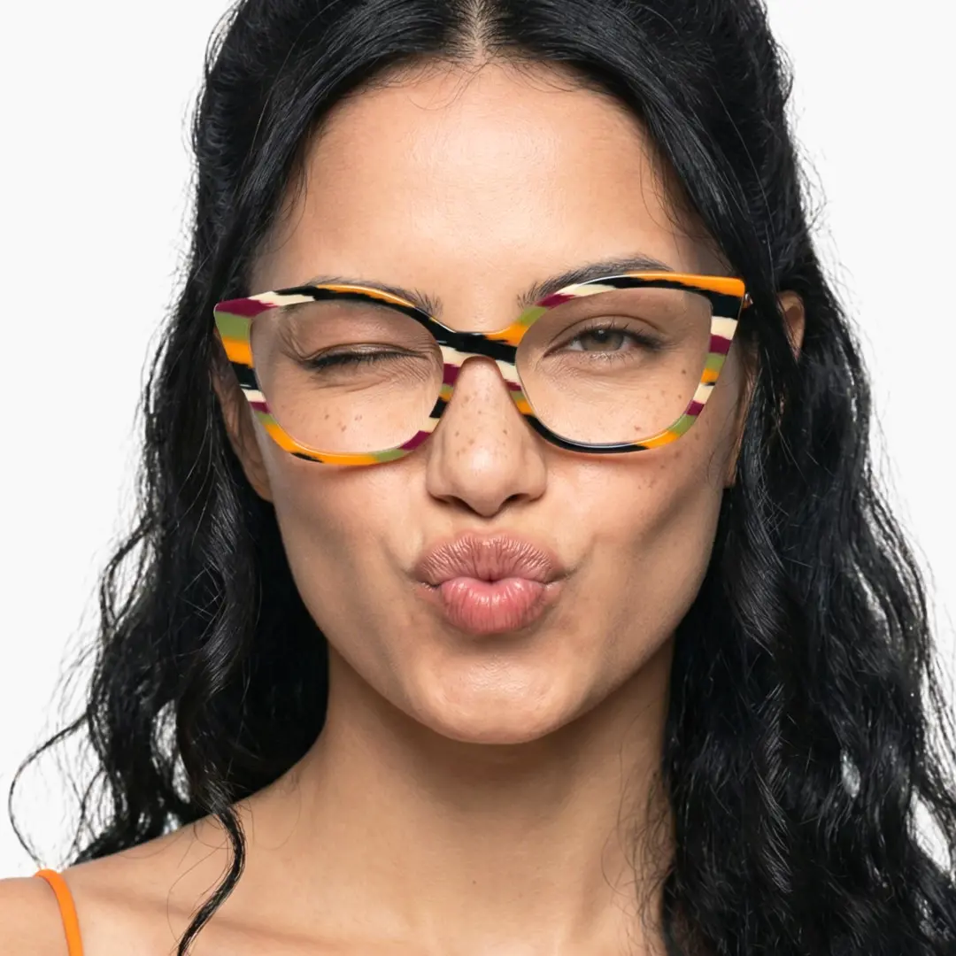 Front view of female wearing colorful orange cat eye eyeglasses, winking & pouting, CA0102306