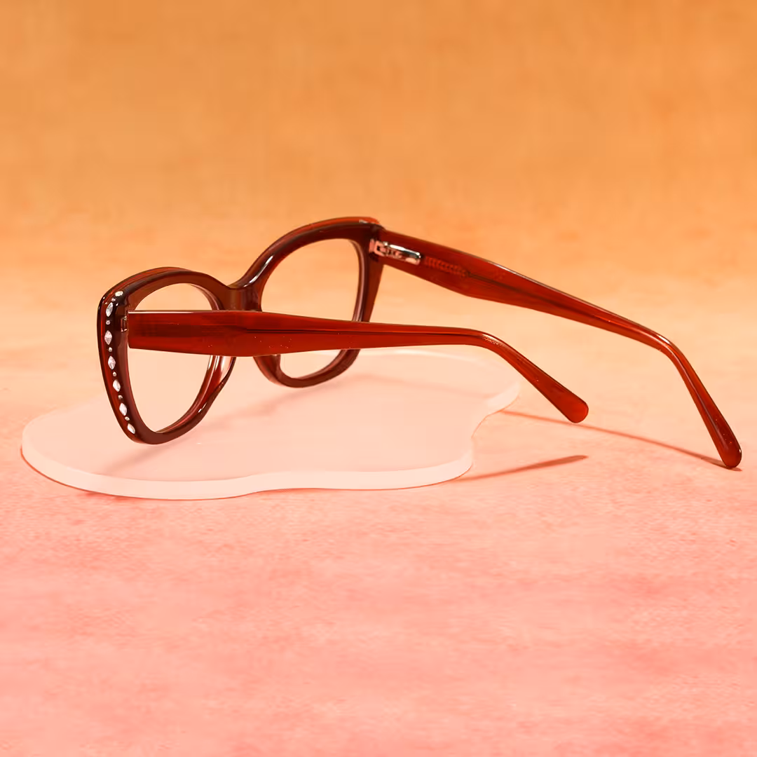 Scene close-up view of Celeste cat eye acetate eyeglasses CA0152605 in red