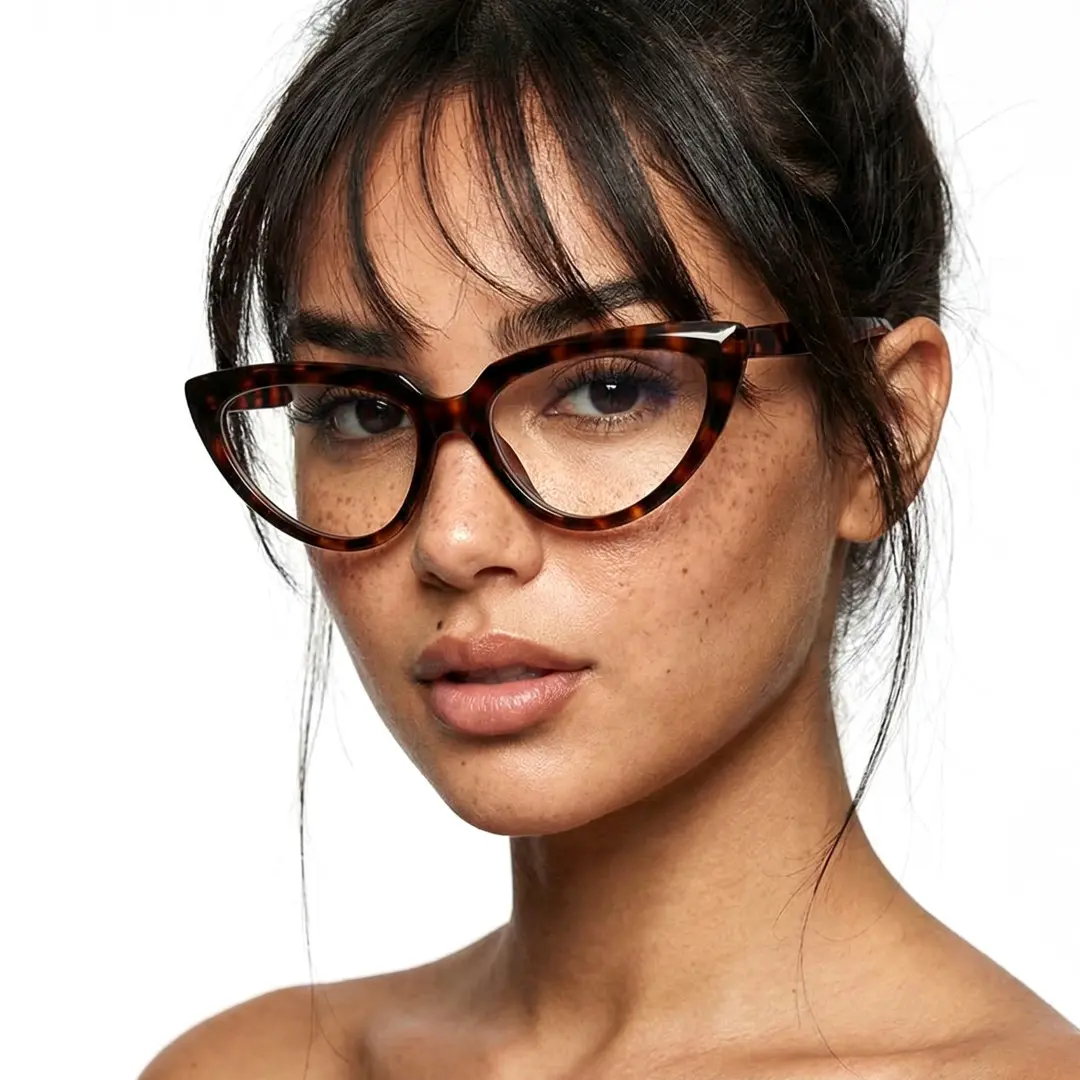 Slightly angled view of female wearing tortoise cat eye eyeglasses, neutral expression, CA0182311