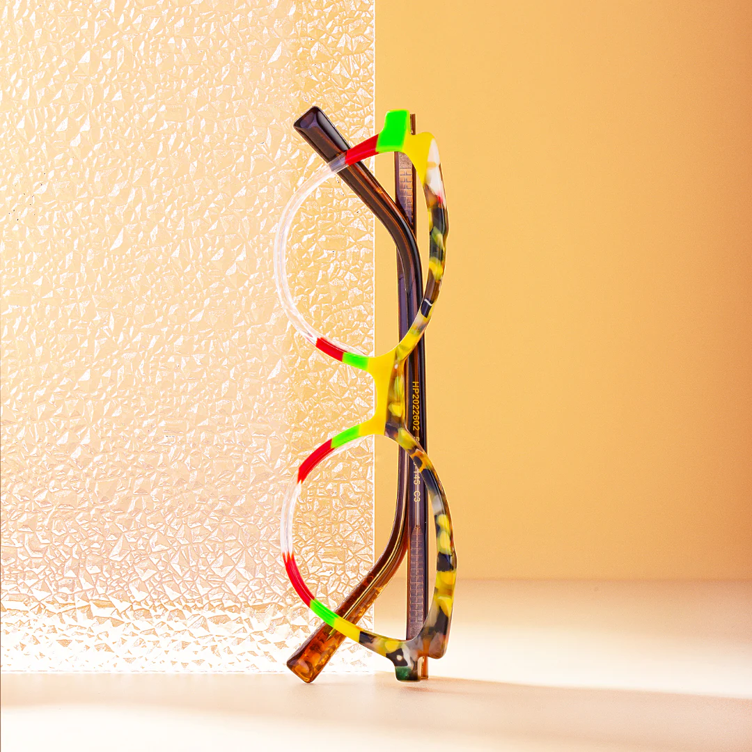Scene close-up view of Prince colorful cat eye acetate eyeglasses CA0222306 in multicolor