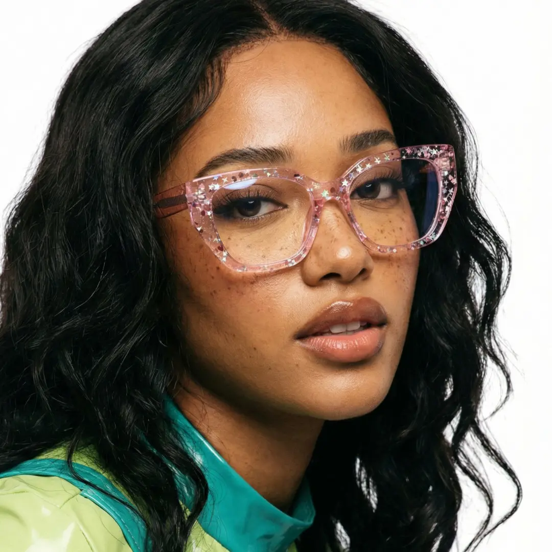 Slightly angled view of female wearing pink cat eye eyeglasses, natural expression, CA0282601