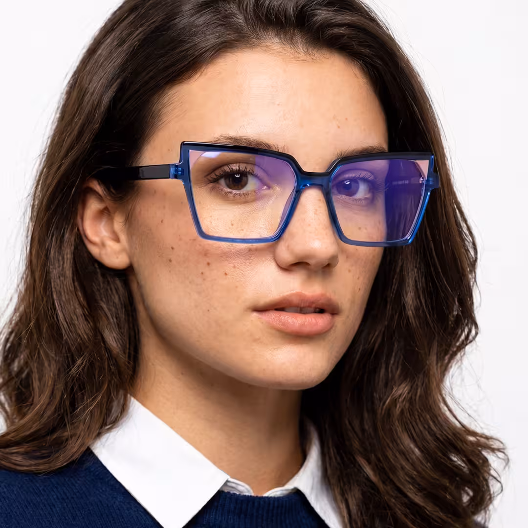 Female wearing colorful blue cat eye acetate eyeglasses, looking relaxed while looking at camera. SPU: CA0342605