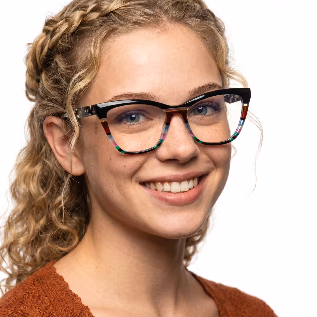 Female wearing colorful black cat eye acetate eyeglasses, smiling while looking at camera. SPU: CA0452605