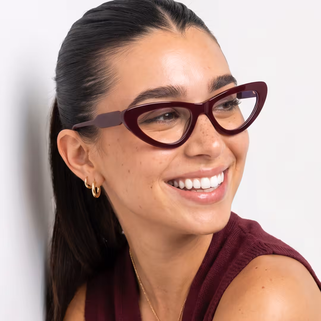 Female wearing office siren red cat eye acetate eyeglasses, smiling. SPU: CA0462605