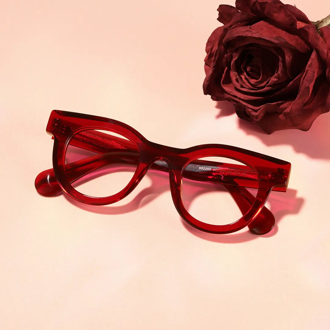 Scene close-up view of Gali round acetate eyeglasses CA0532302 in red