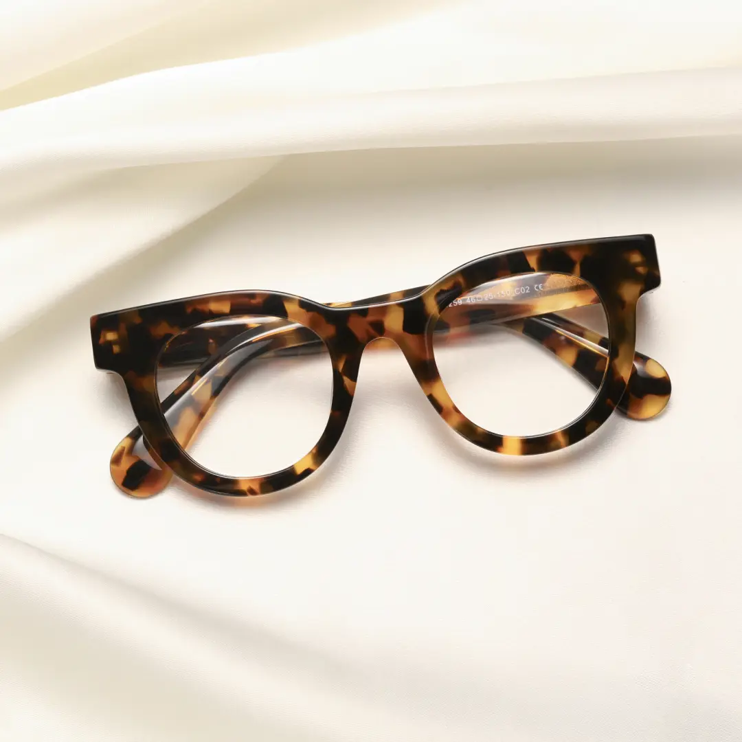 Scene close-up view of Gali round acetate eyeglasses CA0532302 in tortoise