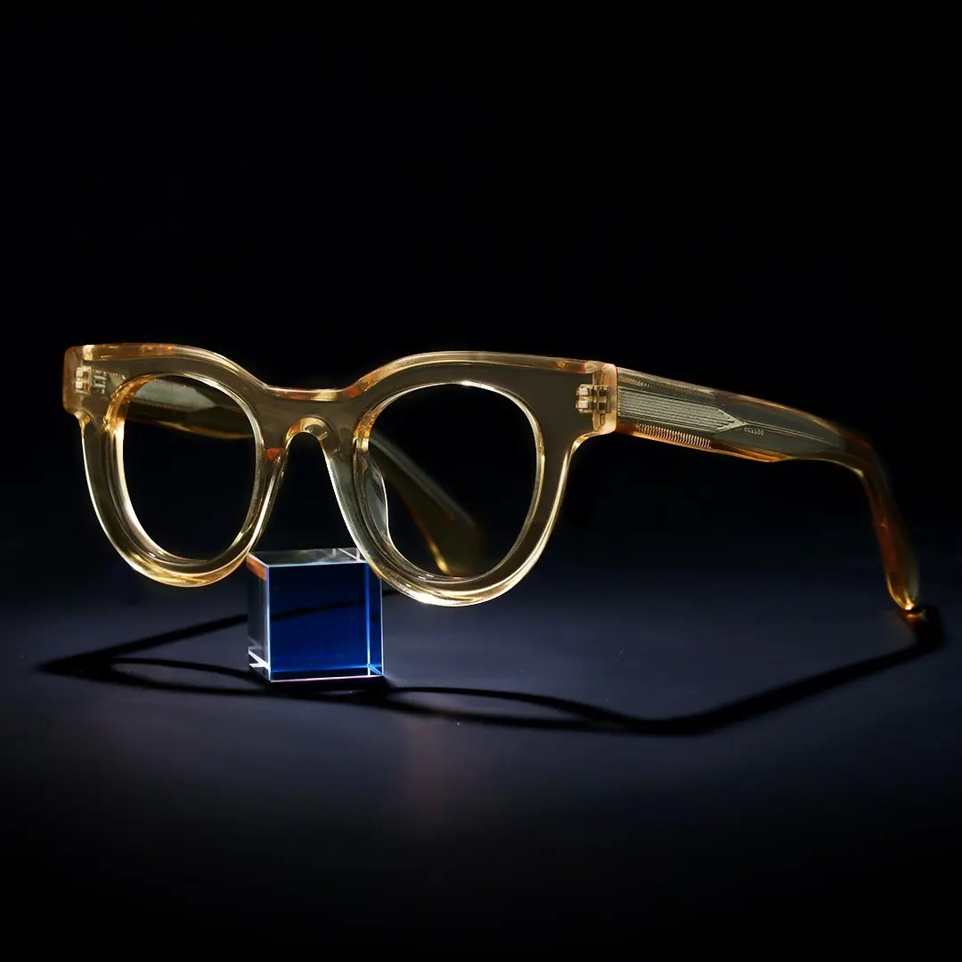 Scene close-up view of Gali round acetate eyeglasses CA0532302 in yellow