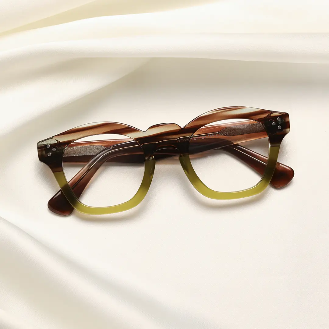 Front folded view of Wonda cat eye acetate eyeglasses CA0542302 in brown