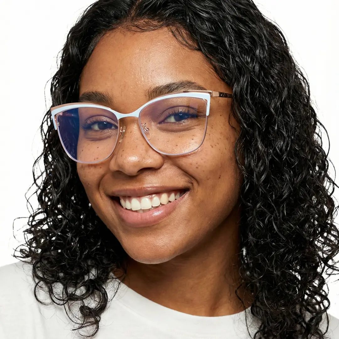 Slightly angled view of female wearing blue cat eye eyeglasses, smiling, CM0022208