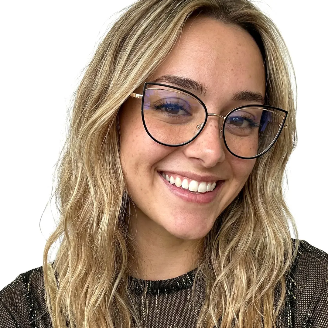 Front view of female wearing black cat eye eyeglasses, smiling, CM0042408