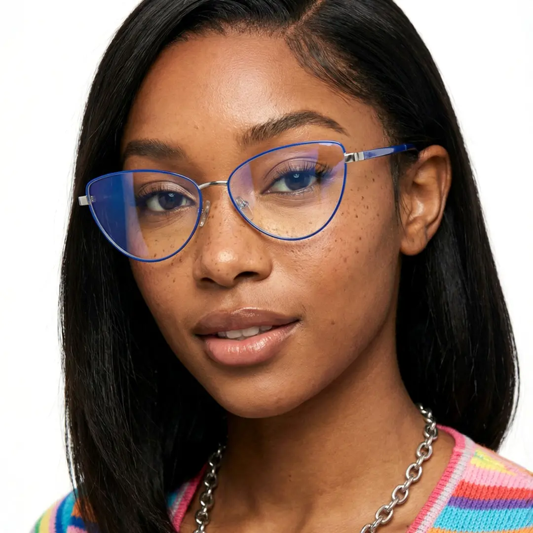 Front view of female wearing blue cat eye eyeglasses, natural smile, CM0072208