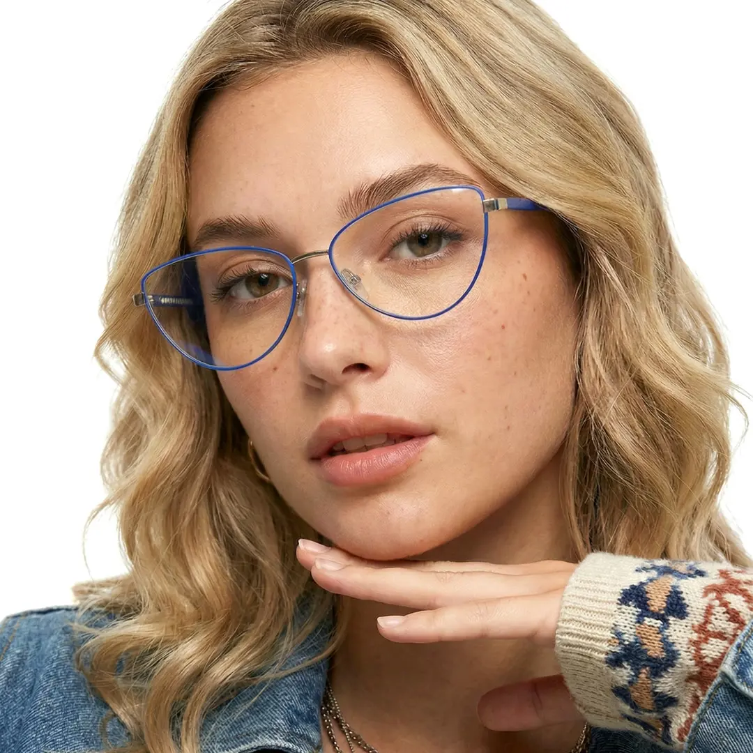 Front view of female wearing blue cat eye eyeglasses, smiling, CM0072208