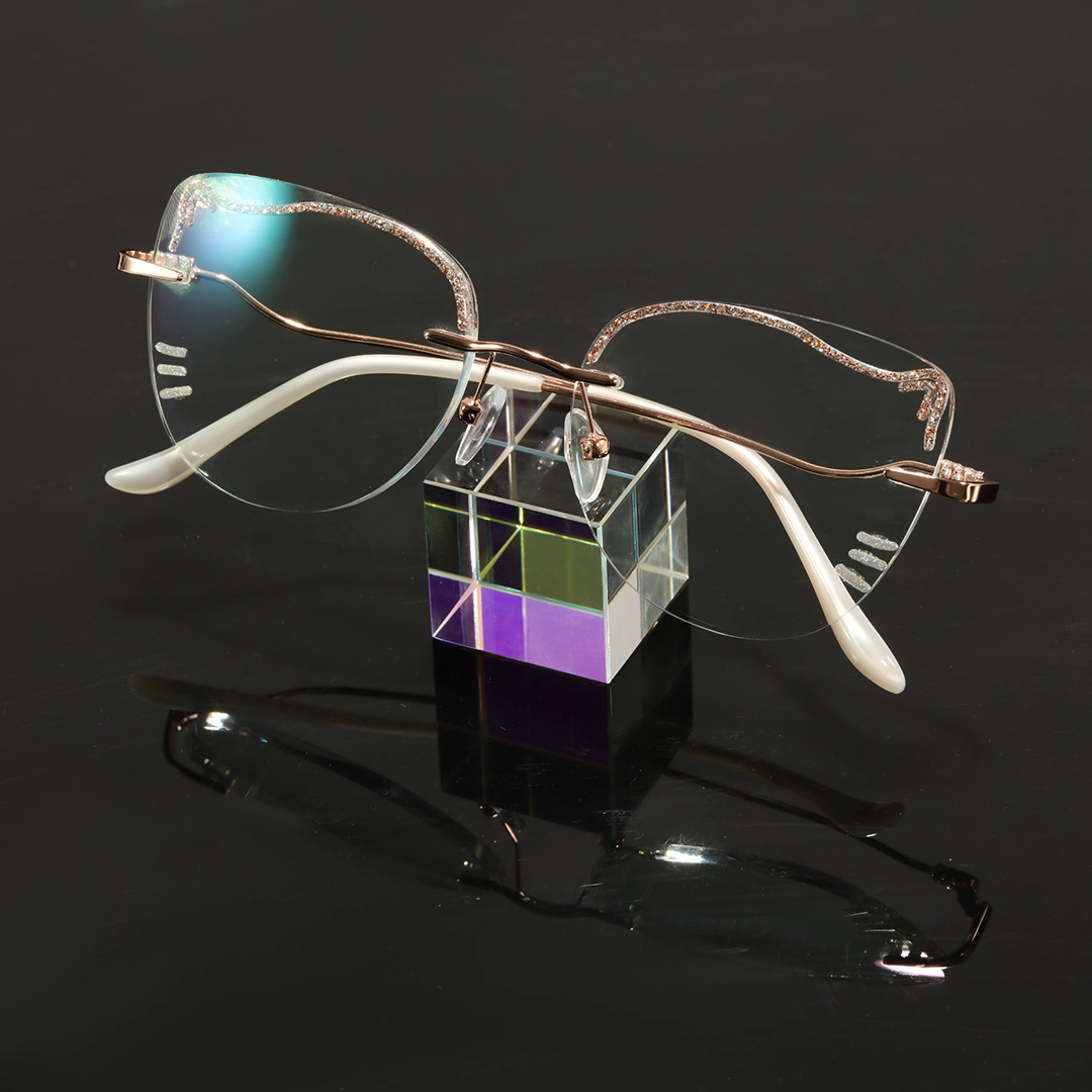 Scene view of kitty cat eye metal eyeglasses CM0142511 in clear