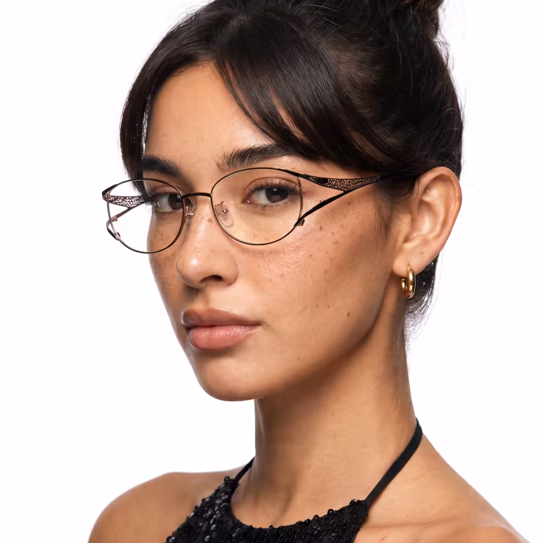 Three-quarter view of fashion black cat eye eyeglasses, neutral expression. SPU: CM0262605