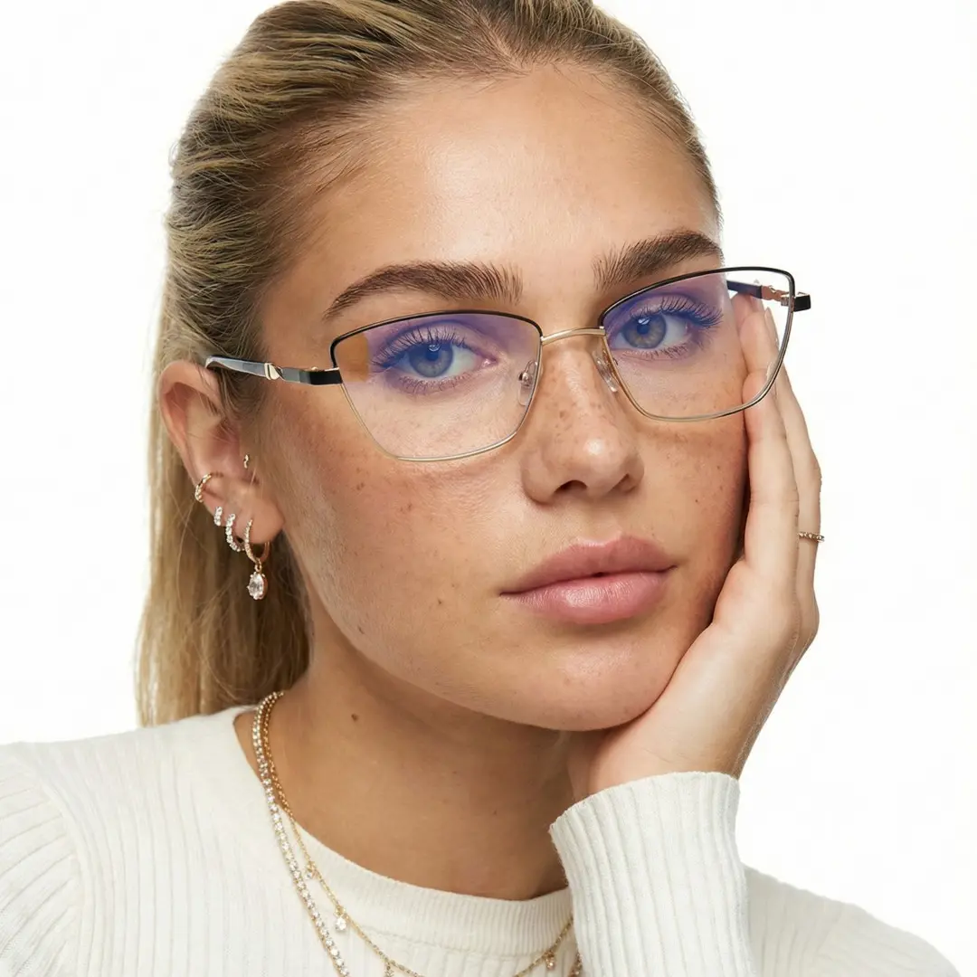 Three-quarter view of female wearing office siren black cat eye eyeglasses, resting chin on hand, neutral expression, CM0452302